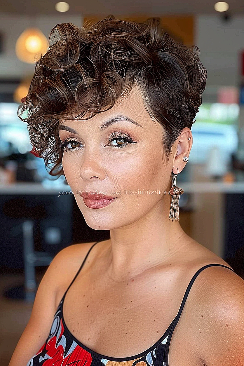 Bouncy curly pixie cut