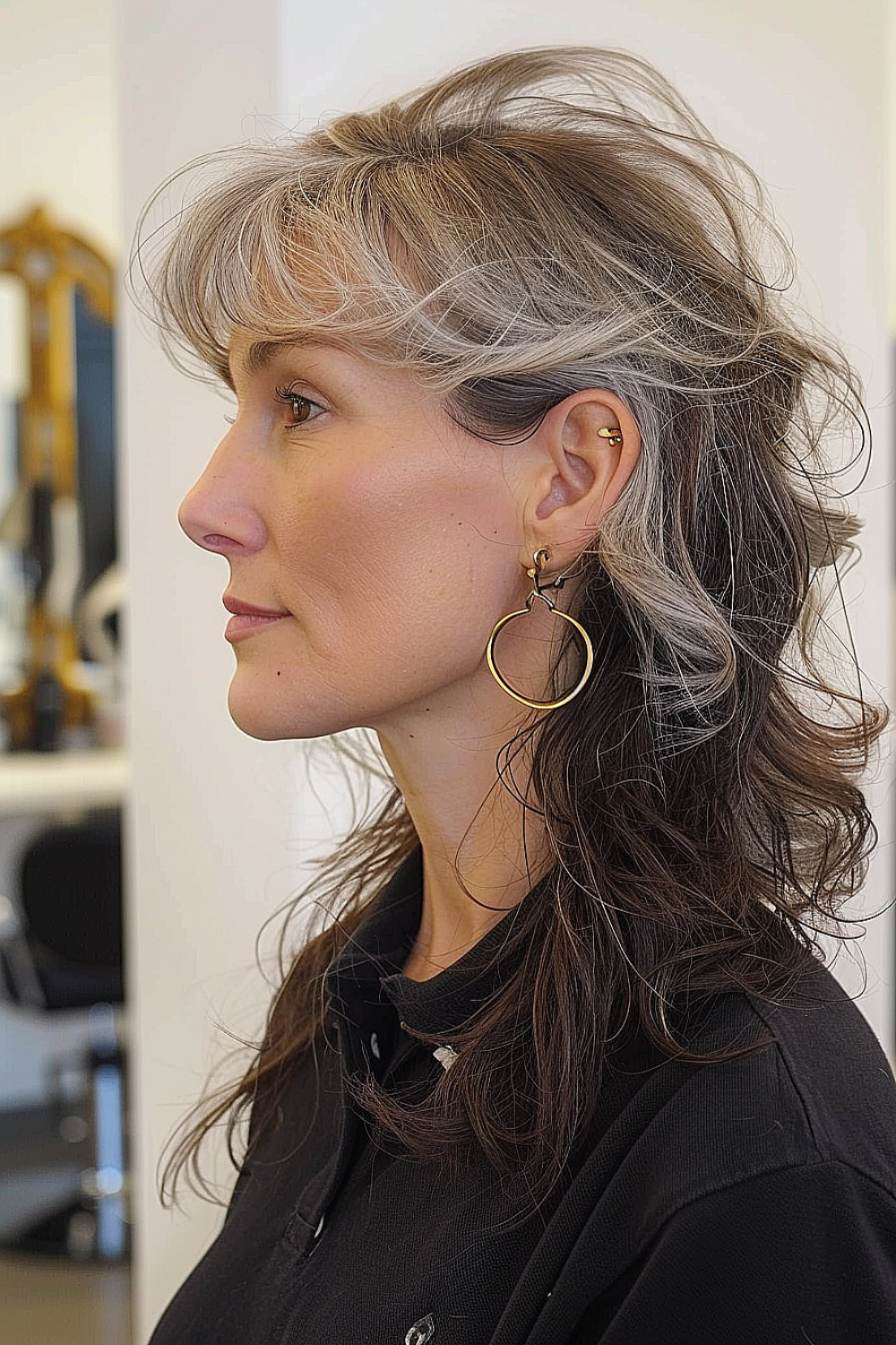 Silver-toned mullet shag with voluminous layers for women over 70