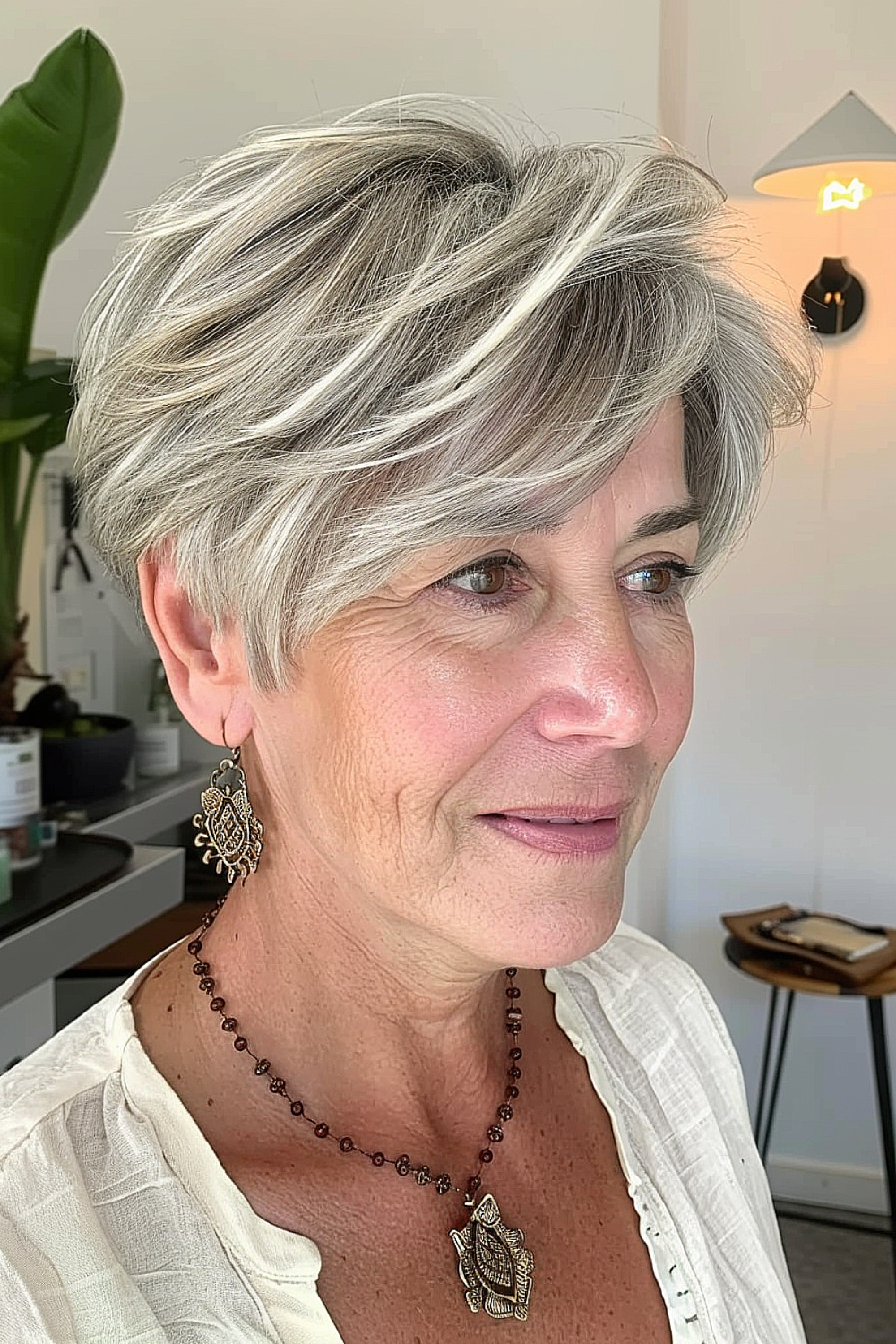 Feathered pixie cut for thin hair on a woman over 50