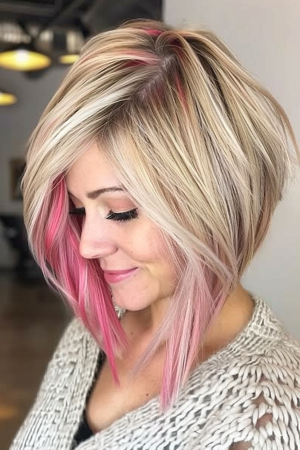 Inverted bob with pink peekaboo highlights