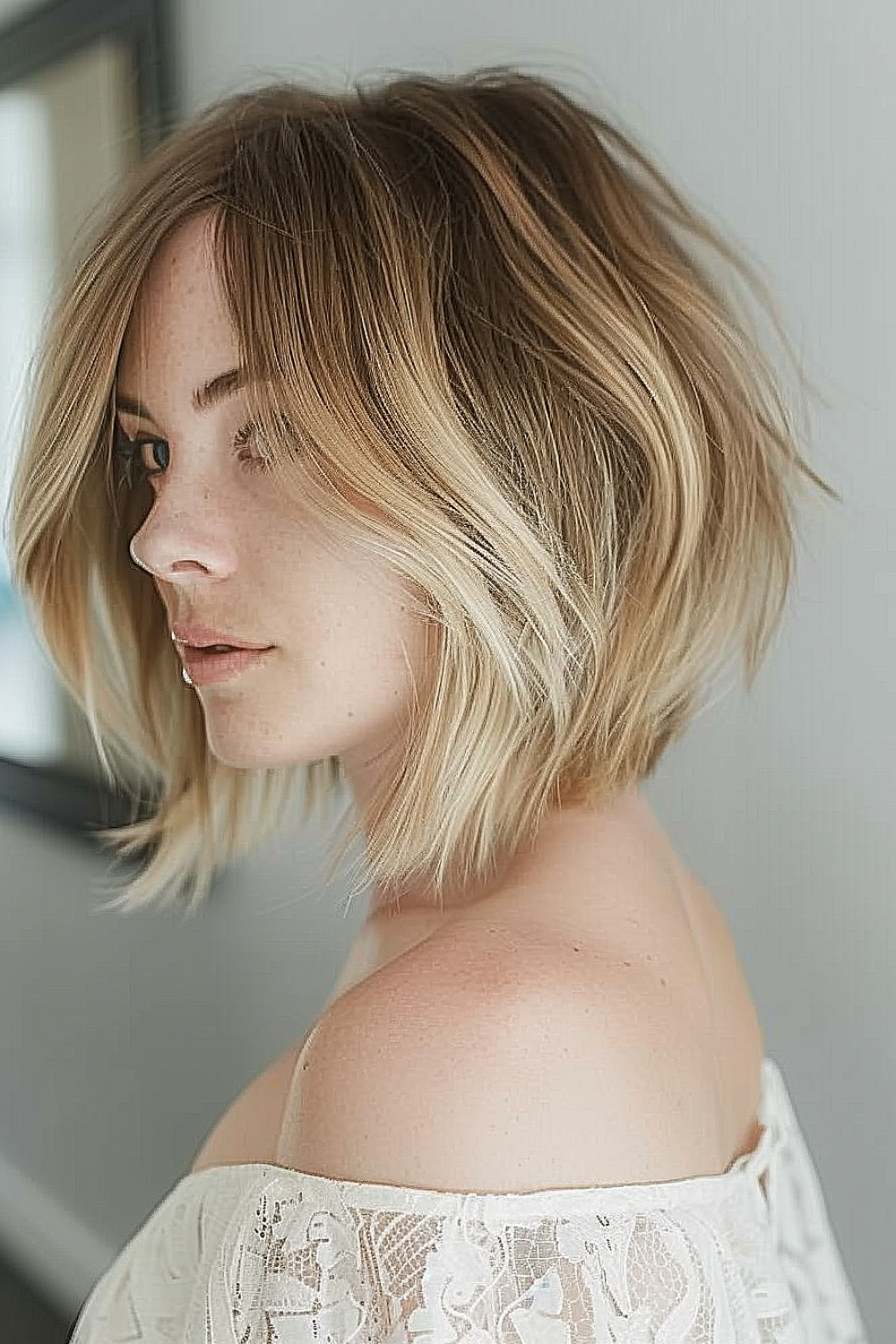 Layered bob haircut with blonde ombre