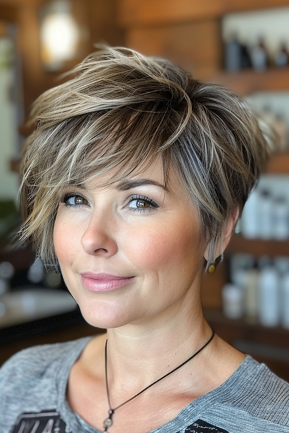 Layered pixie with side-swept bangs