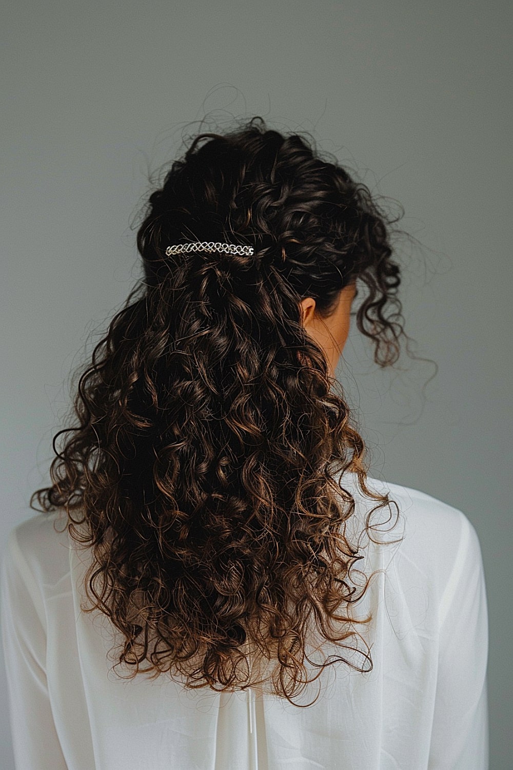 Medium curly hair with hair clip