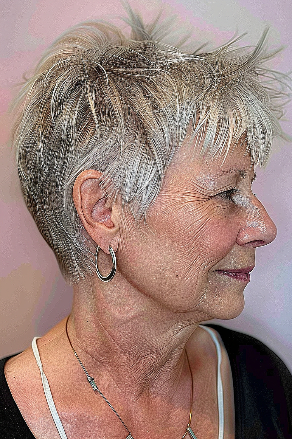 Woman with a modern pixie cut featuring sharp edges