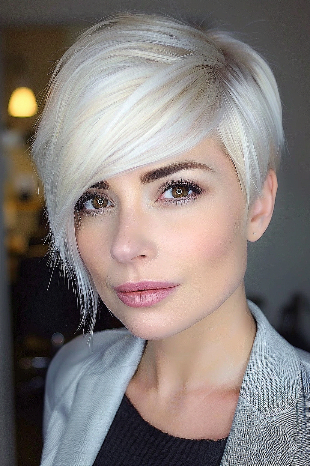 Platinum blonde pixie with layered dimension