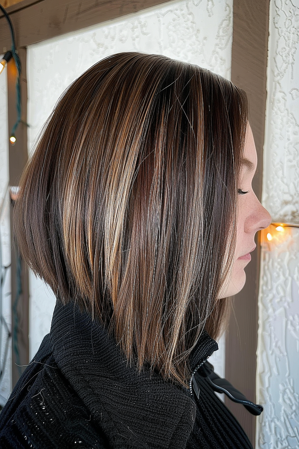 Razor cut bob with chunky lowlights and sleek texture