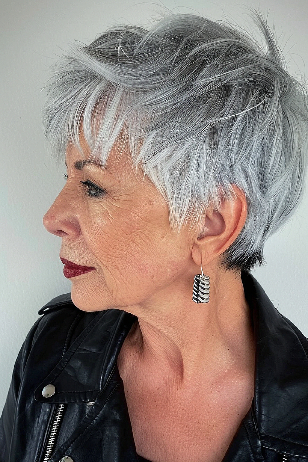 Salt and pepper pixie cut with textured layers and edgy fringe