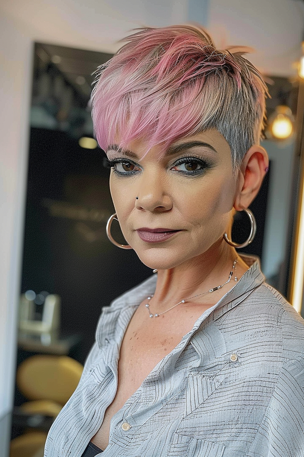 Short pixie cut with pastel pink tips