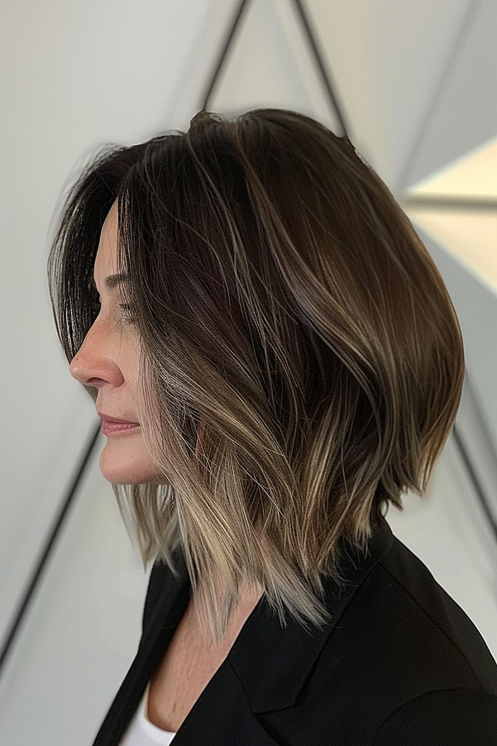 Sleek angled lob with razor cut ends for a modern finish