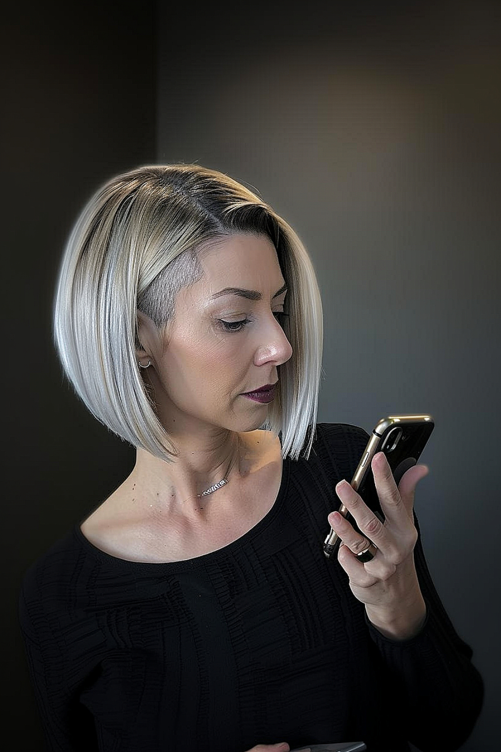 Sleek bob hairstyle with undercut details