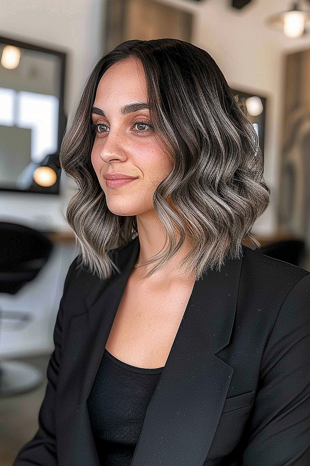 Sleek wavy lob with a subtle gradient from dark roots to lighter ends