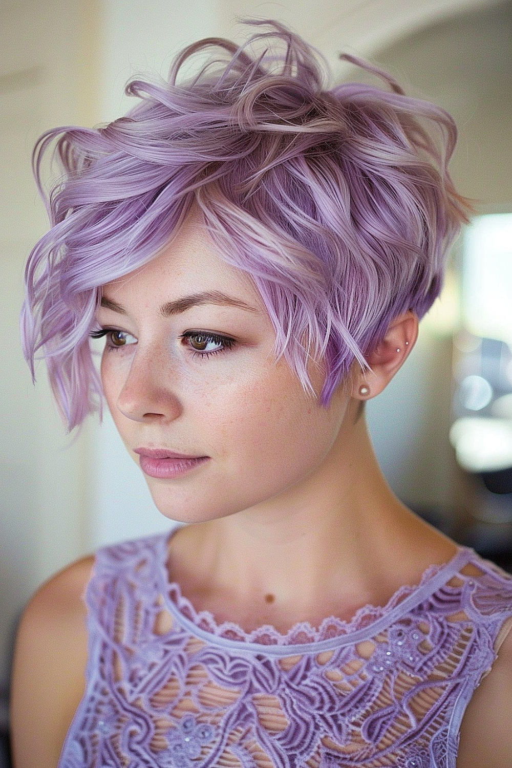 Soft lilac layered pixie with wispy bangs