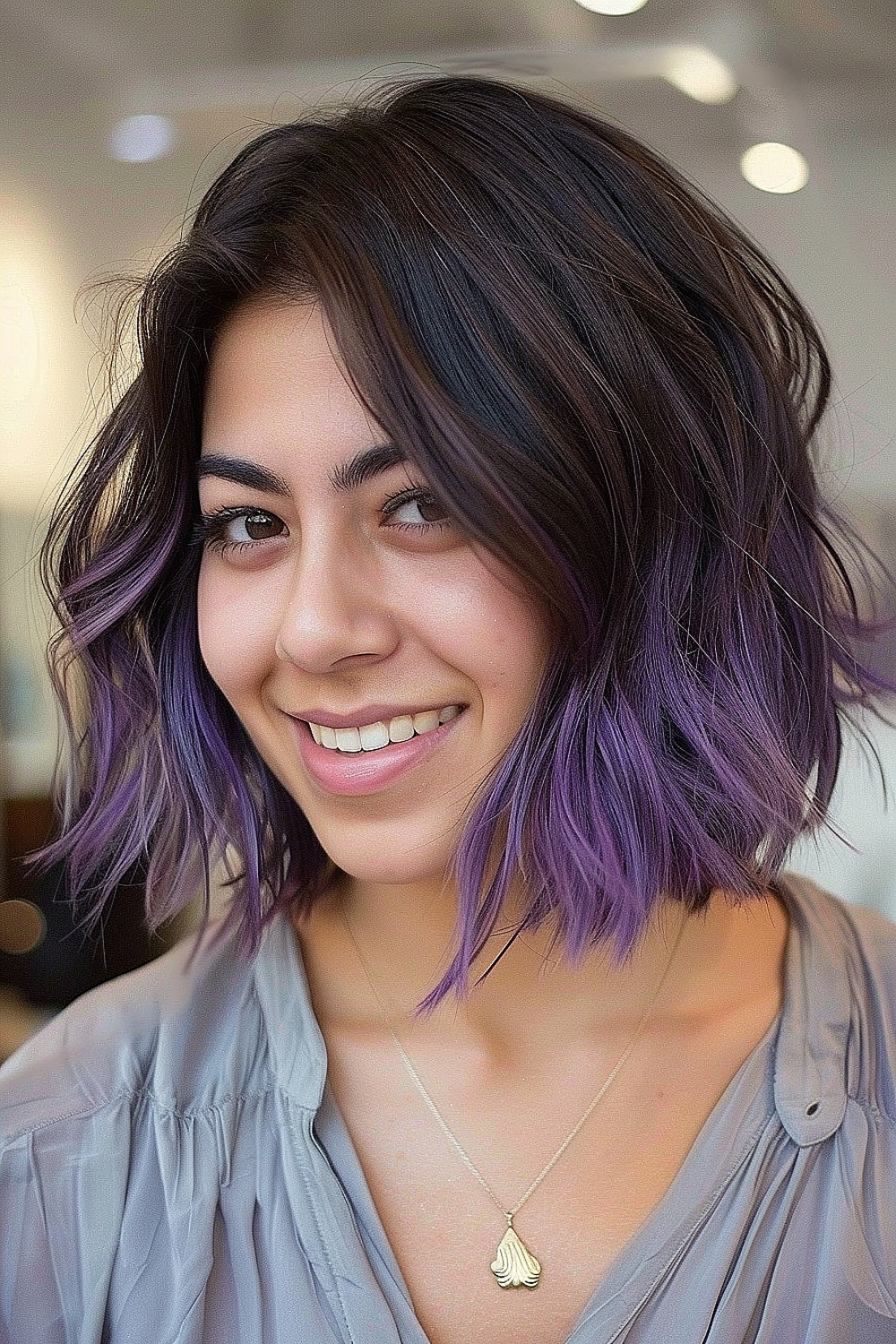 Woman with a textured bob and lavender ombre