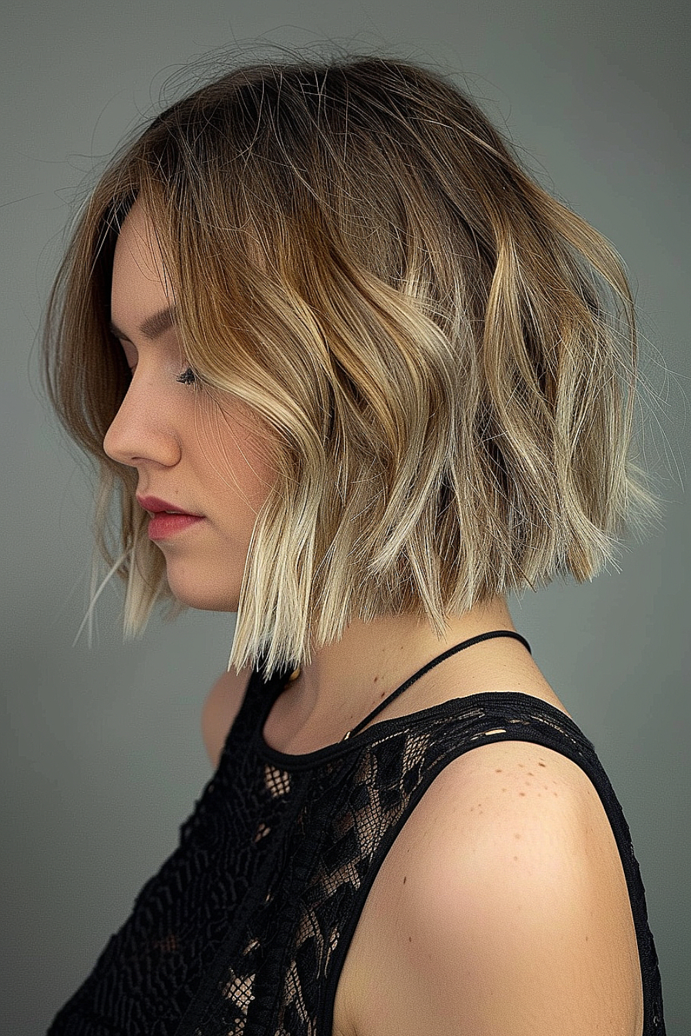 Textured razor bob with blonde highlights