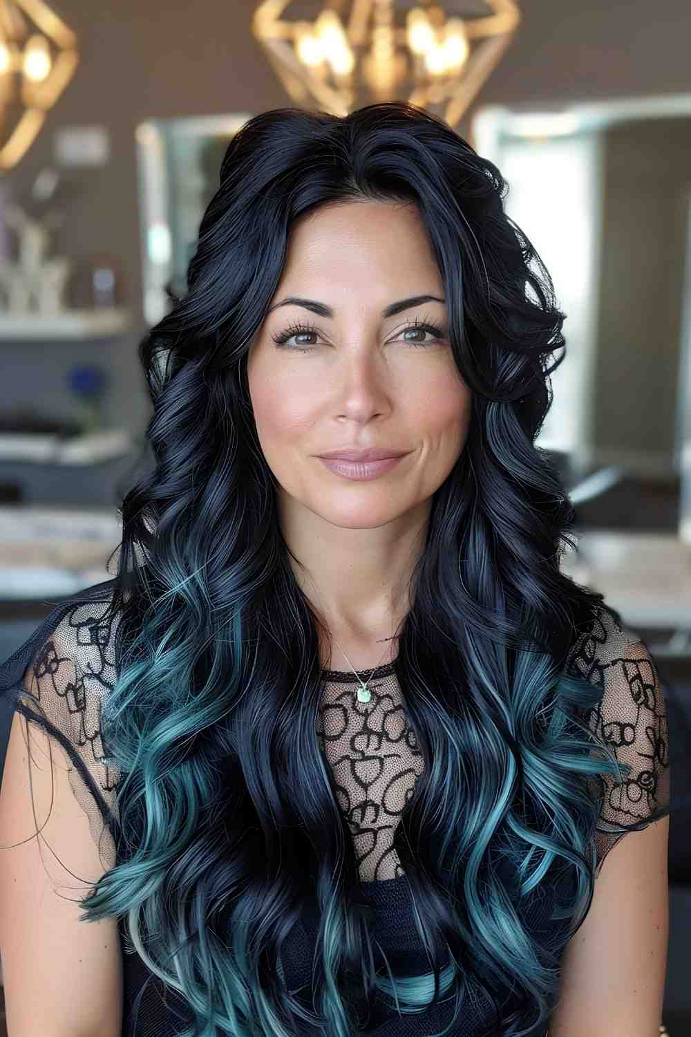 Turquoise tips on black waterfall curls